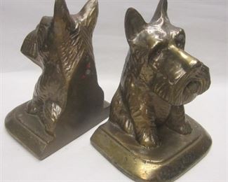 Pair of vintage white metal bookends with brass plating.  5.25" tall

