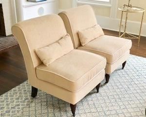 45. Pair of Cream Slipper Chairs on Casters (26" x 26" x 33")