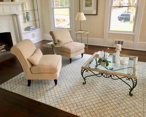 49. Custom Coffee Table w/ Metal Base and Beveled Glass Inset Top (38" x 38" x 16")                                                   50. Safavieh Wool and Cotton Ivory/Blue Abstract Area Rug (8' x 10')55.                                                                                                  Pair of Cream Parson Chairs (22" x 23" x 47")