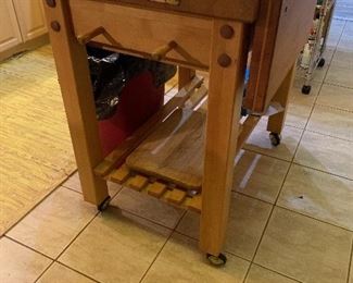 Butcher block island on wheels.