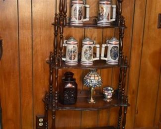 Beautiful Collector Steins and More! The shelving Unit is staying with the Family.