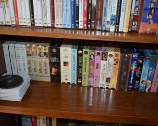 Collectible VHS Tapes on Bottom Shelf and DVD's on the top Shelf