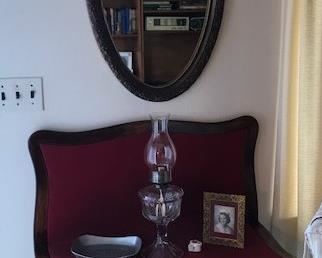 Folding card table and oval mirror.