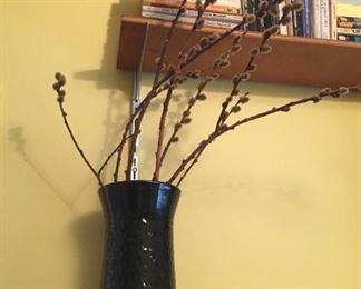 Vase with pussy willows.
