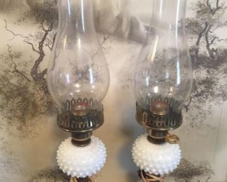 Pair of milk glass hurricane lamps.