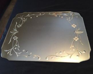Mirror tray with engraving.