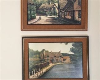 Pair of framed European scenes.