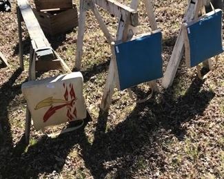 Sawhorses and vintage Bleacher seats.