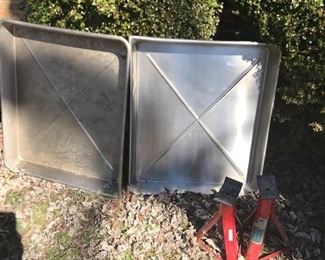 Metal trays and jacks.