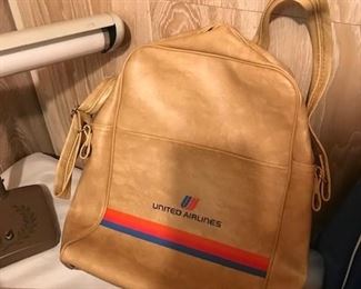 United Airlines bag.