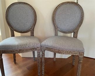 Upholstered oval back chairs by home accents