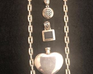 Sterling perfume flask, bracelets, sterling & onyx enhancer and more.