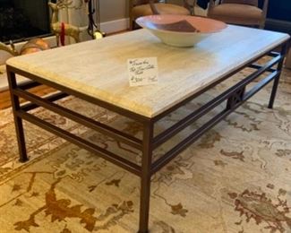 Travertine top with iron base coffee table  20 1/2” tall x 60” long 30” wide. $300
