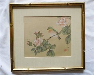 Close Up of Chinese Hand Painted on silk framed art pieces.