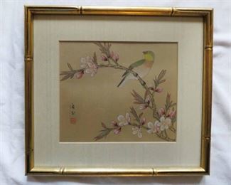 Close Up of Chinese Hand Painted on silk framed art pieces.