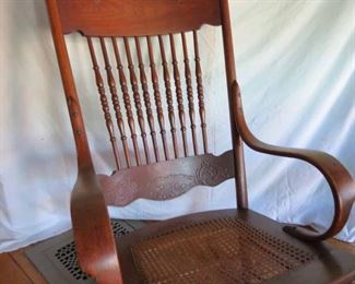 $150.00 Vintage Carved Wood Rocking Chair Woven Cane Seat