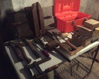 old tools, wood clamps axes