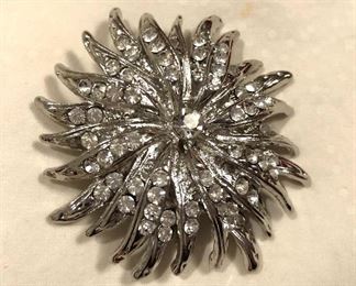 $12 Rhinestone sunburst pin or brooch 2”L