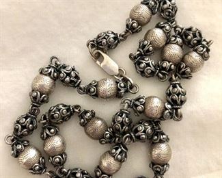 $60 Silver beaded necklace.  Size: 16.5"L
