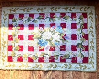$95 - Checkered floral rug - 35" x 23" 