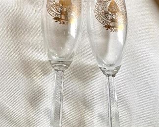 $20 Pair of champagne inaugural glasses. Each 2" diam, 8" H.  