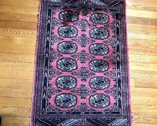 $130 Red medallion rug #2.  25" x 41".  Minor discoloration on upper left hand corner 