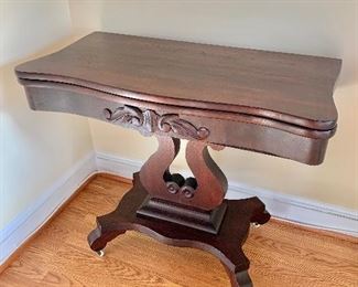 $295 - Vintage game table on casters.  36" W, 18" D, 28" H, plus 18" leaf extension. 