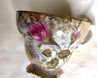 Floral cup gold trim.  2.5" diam, 2" H.  