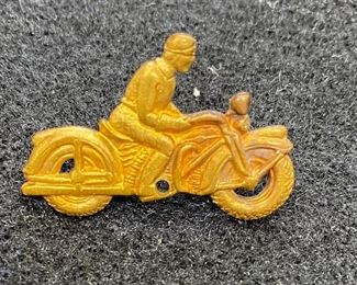 Early Motorcycle pin. Good condition and good clasp. Believe it to be brass. Harley Davidson style motorcycle. Unmarked.
Measures 1 1/4". $60