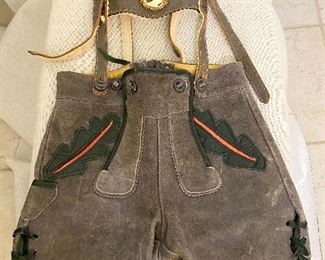 Vintage German Child's Lederhosen. Thick leather with carved Elk Horn medallion. All buttons & straps intack. Purchased in Germany "1960's". $50