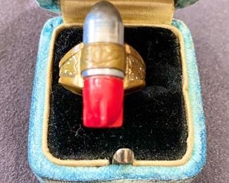 The "Lone Ranger" Atomic Bomb Ring was offered as a premium in 1947 by "Kix" cereals for 15 cents plus a cereal box top. The Lone Ranger was known more for silver bullets but in the late 1940's and early 1950's, society was curious about the power and possibilities of atomic energy.
Ring is in great condition and has an adjustable band. Measures 1" long. The sides and the top has some engravings. $85