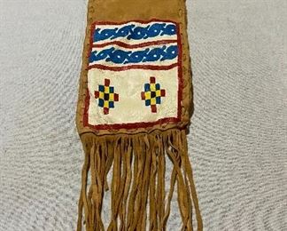 Elk skin painted fringed bag. $45