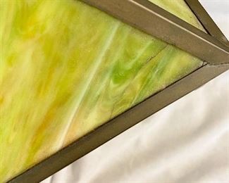 Additional photo of hairline crack in panel of lamp.