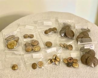 One lot of military buttons. Some are Army and Navy. Brass and "Waterbury Co.", eagles, anchors. (Total of 41). All one money. $40
