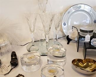 Orrefors candle holders and Waterford champagnes