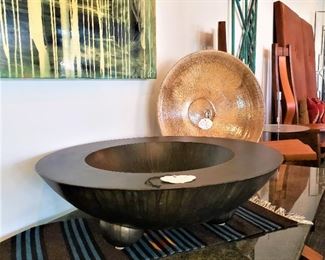 Large footed metal bowl