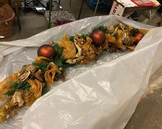 Beautiful large mantel artificial Christmas wreath.