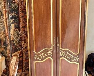 $695; French style carved armoire; as is, hole cut in the back for cords. 81" H x 39" W x 20" D 