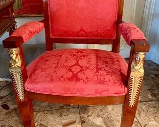 $1,400; PAIR Empire arm chairs upholstered in red damask with gilt embellishments and claw feet. 37.5” H x 20.5" W x 20.5" D.  Seat height 19”.  CHAIR #1 AS SHOWN