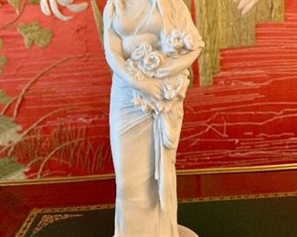 $80; Ceramic figurine of a woman with flowers after a sculpture by Theodore Riviere; 9" H x 3" D