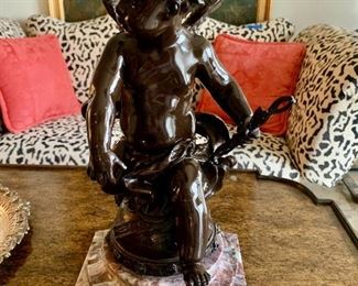 $895; Leon Pillet (1840-1916) ; 'Maitre du Monde' cast metal cherub on marble base; signed; 14.5" H x 7.5" W x 7.5" D. Cast metal with coating.