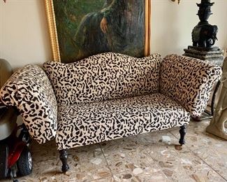 $750; Needlepoint animal print settee, 35" H x 72" W x 31" D, seat height is 24" 