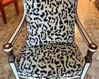 $900 Pair: Regency style arm chairs upholstered in needlepoint animal print with pillows; 36" H x 22.5" W x 19.5" D, seat height is 19"