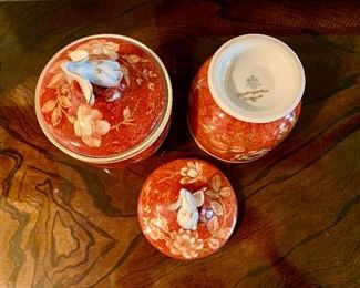 $80 - Pair of Rosenthal Handpainted Jars with Lids, Rust Orange and Gold Trim; each is 7" H x 4" diameter; as is, tiny chip in one flower on lid.