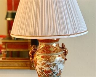 $250; Kutani style ceramic lamp with pleated shade, tested and working. 31" H with 7" diameter base and 18" diameter shade