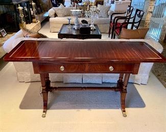 $450; Drop leaf 2-Drawer Regency style onsole table; 29.5" H x 42" W with leaves down (62" wide with leaves up) x 22" D 