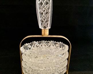 $70; Set of 4 Ashtrays/Nut Dishes in Stand; 9" H, four 4" x 3" dishes