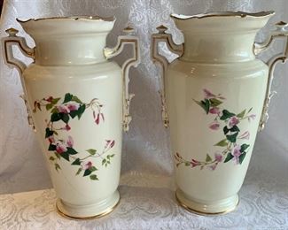 $200 - Pair of Decorative Vases with Roses and City Scenes; as is, top of one vase is broken at the rim; 13” H x 8” W