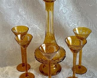 $60 - Etched amber glass decanter and five cordials AS IS (all cordials in this set have chips) 