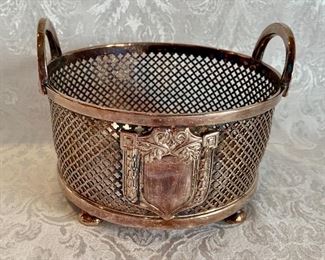 $45; Silver plate wine coaster with handles; 4” H x 5” W